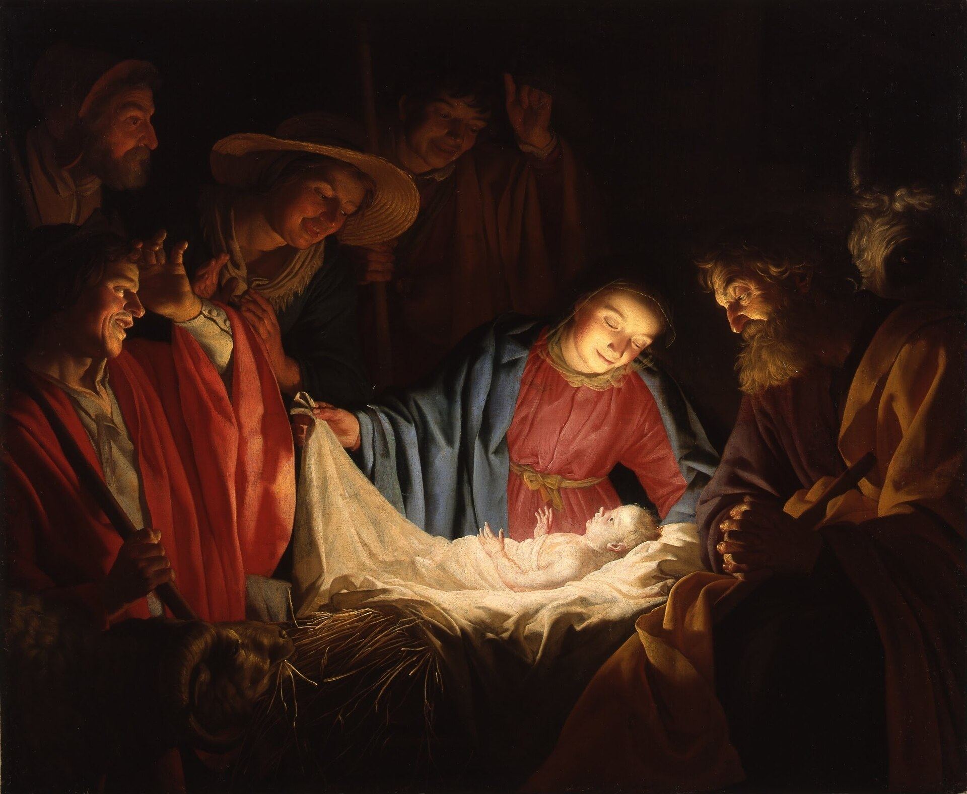 Night scene of Mary, Joseph, and working shepherds leaning over a newborn child laid in a feeding trough, the only light in the painting coming from the child himself.